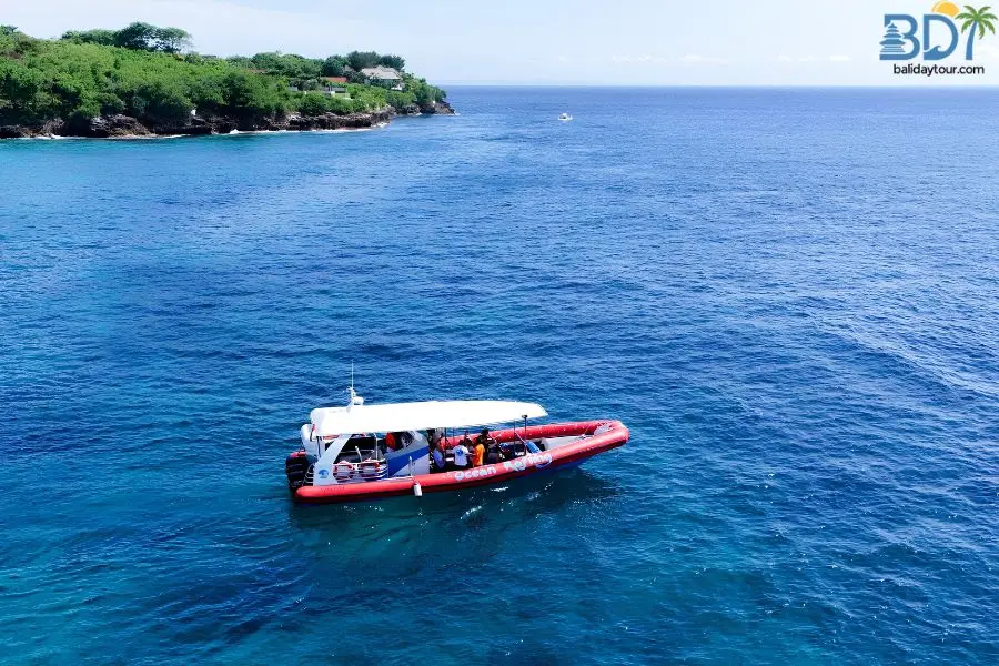 Speed across the ocean on an ocean rafting tour to Nusa Penida to visit Kelingking Beach, Angel's Billabong, and Broken Beach.